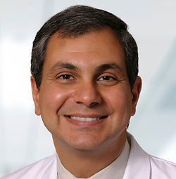 William Abraham, M.D., F.A.C.P., F.A.C.C., F.A.H.A., F.E.S.C., F.R.C.P.E